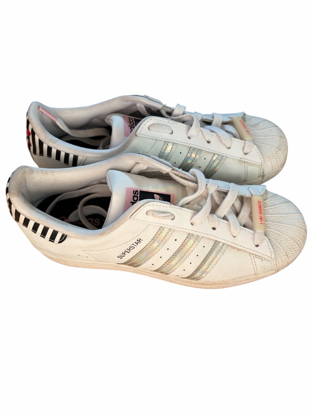 Adidas superstars with silver stripes